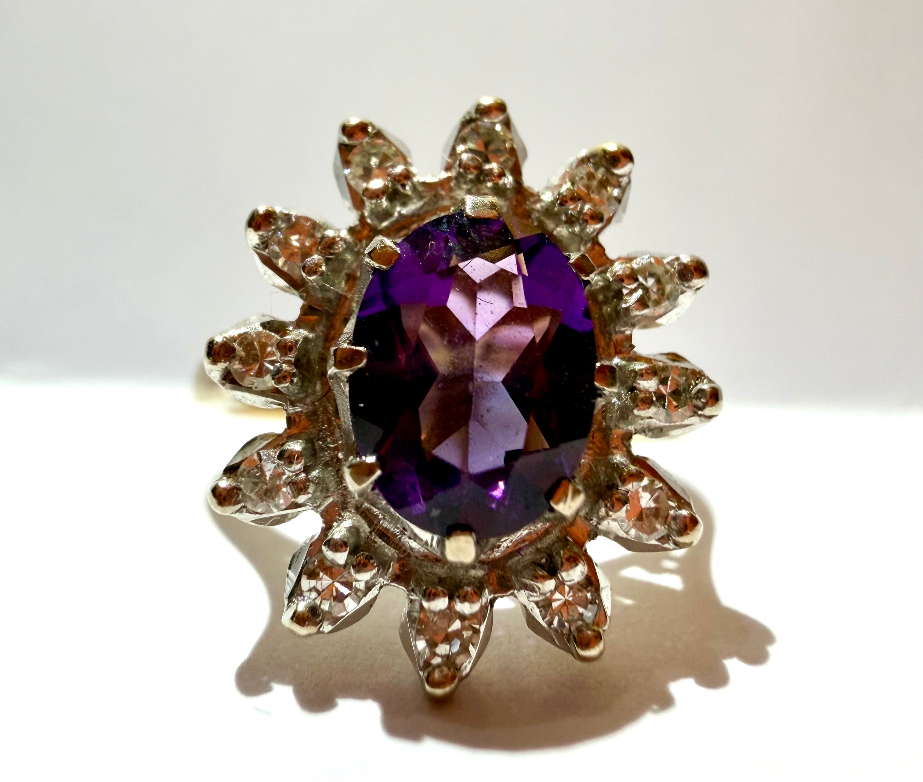 Lot 85: 18ct Yellow Gold Platinum Amethyst Diamond Halo Ring