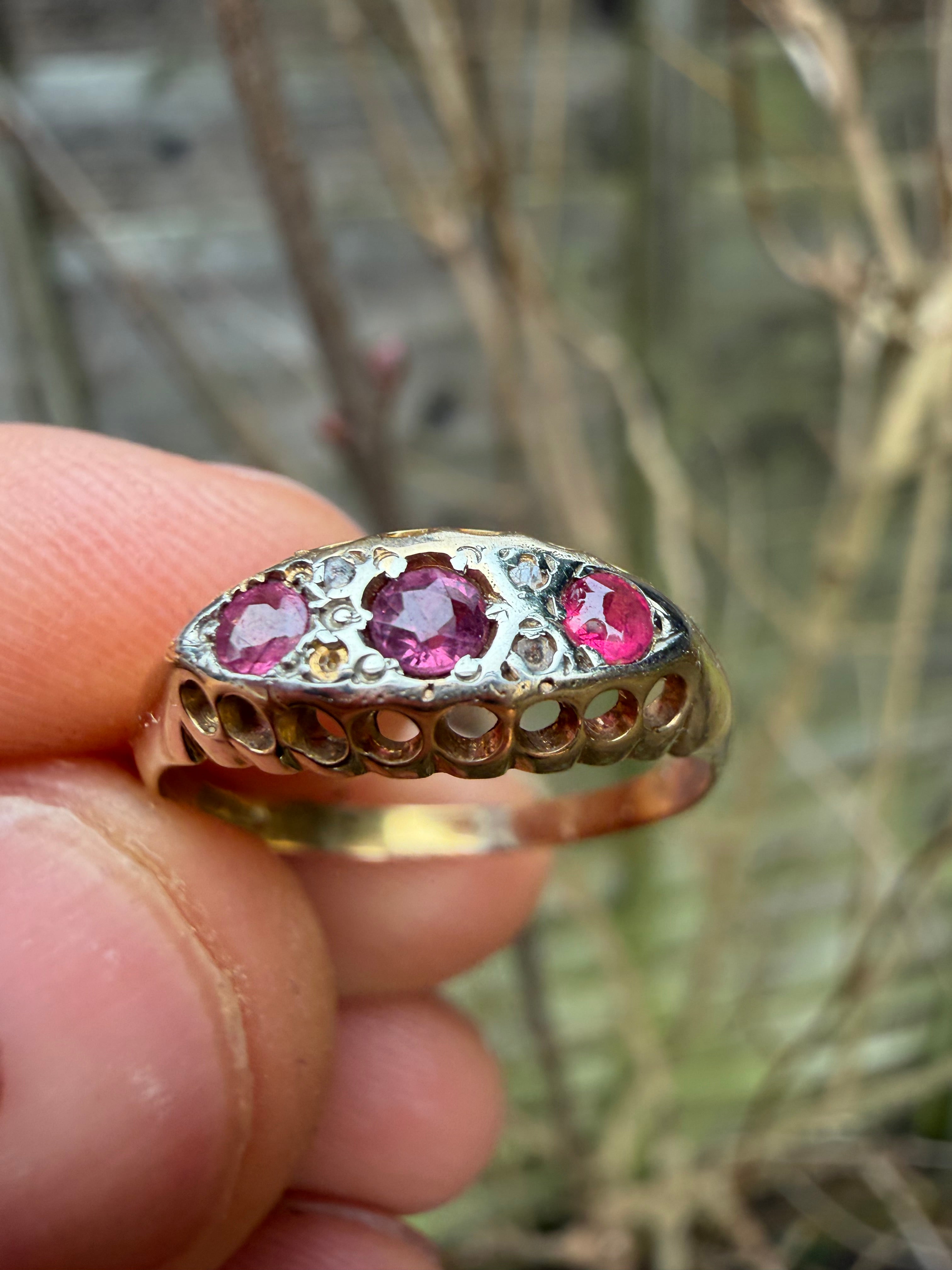 Lot 12: 18ct Ruby Trilogy Yellow Gold Ring