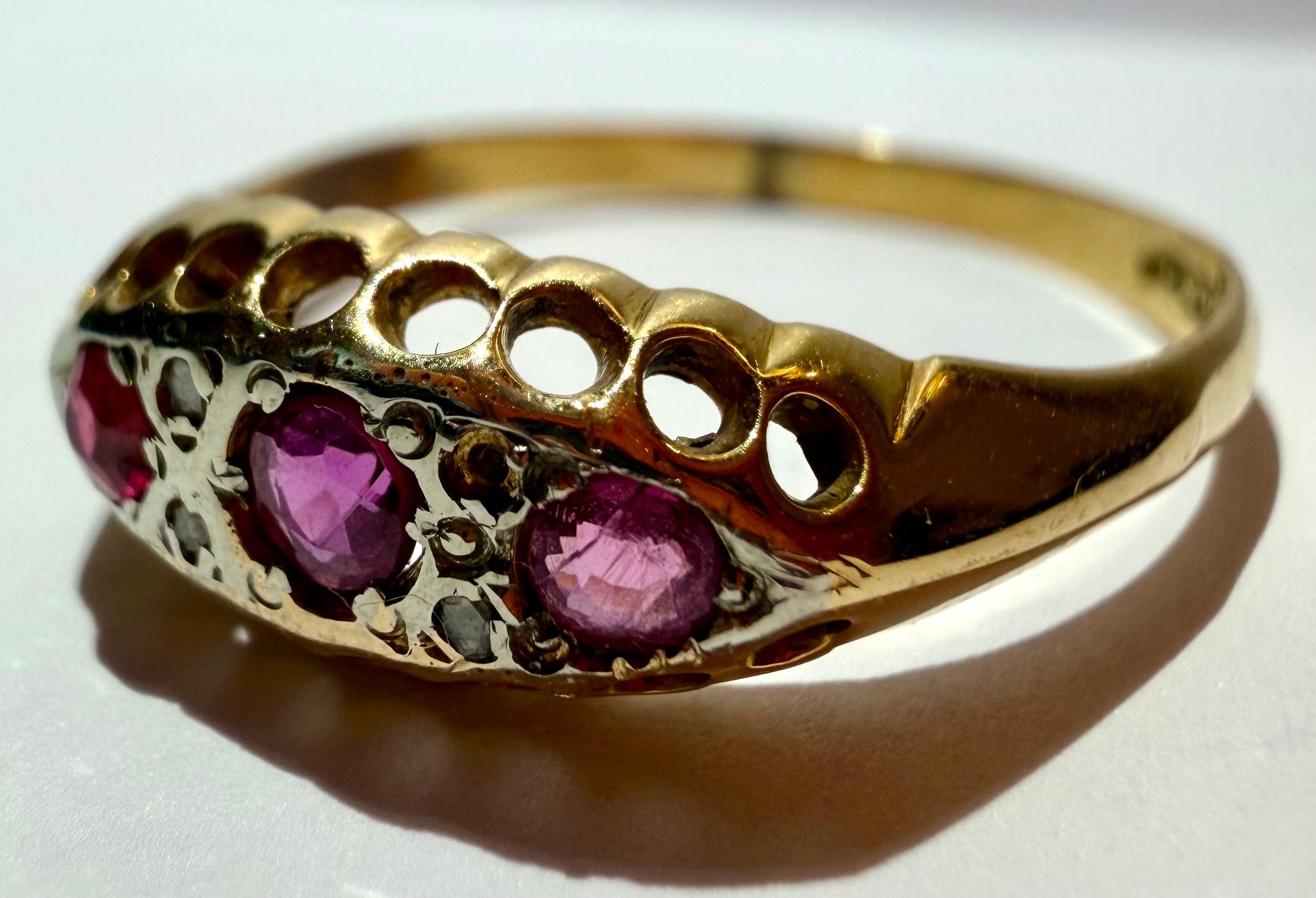 Lot 12: 18ct Ruby Trilogy Yellow Gold Ring