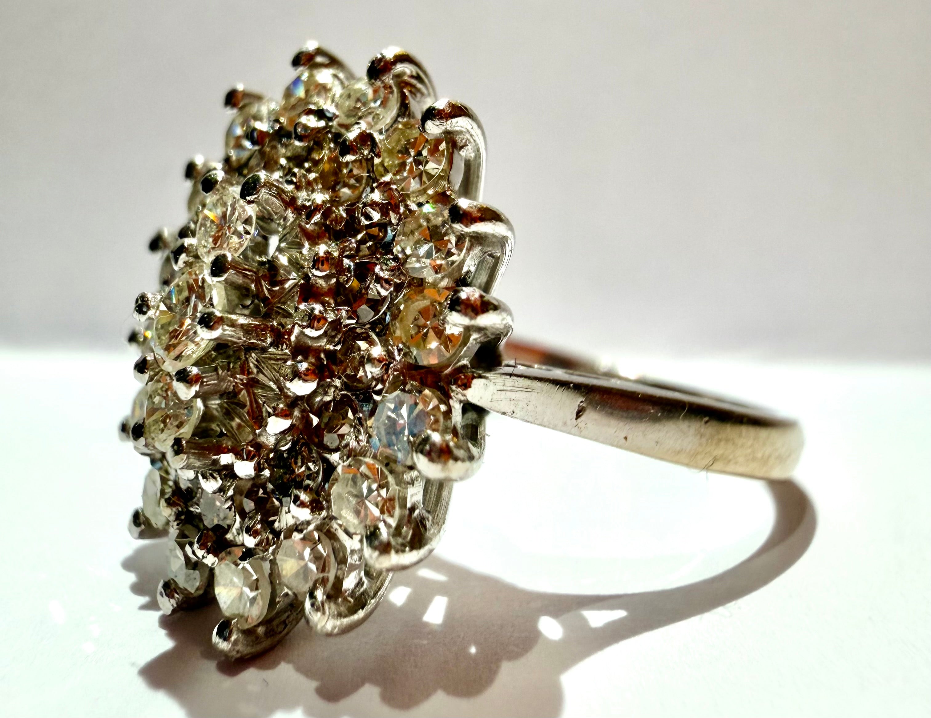 Lot 83: 18ct (36) Natural Diamonds White Gold Ring